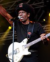 https://upload.wikimedia.org/wikipedia/commons/thumb/5/56/Eddy_Grant_at_Supreme_Court_Gardens_cropped.jpg/100px-Eddy_Grant_at_Supreme_Court_Gardens_cropped.jpg